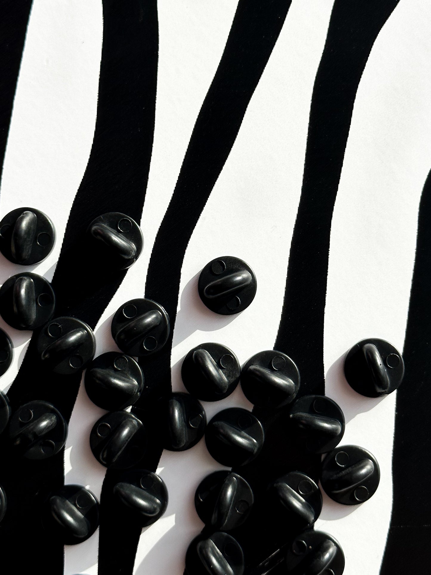 Black Rubber Pin Backing